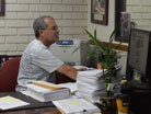 Eric at work in his office